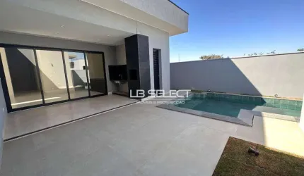Casa no Condomínio Arts com três suítes, escritório com lavabo e varanda gourmet completa.