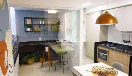 Apartamento no bairro Shopping Park com dois quartos, suíte e varanda gourmet.