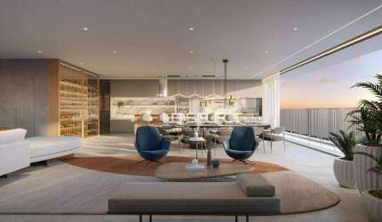 Apartamento com quatro suítes, ampla varanda gourmet e quatro vagas de garagem.