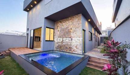 Casa no Condomínio Terras Alpha com três quartos e varanda gourmet.
