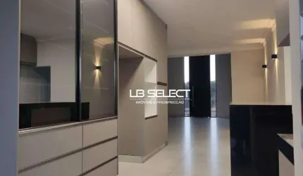 Casa no Condomínio Alphaville I com quatro suítes e varanda gourmet.