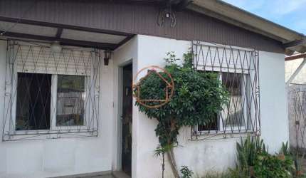 Casa com 3 quartos à venda na Rua Ledo Guimarães Mariante, 320, Jardim Leopoldina, Porto Alegre por R$ 420.000