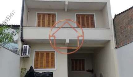 Casa com 3 quartos à venda na Rua Antonio Pedro Baldasso, 69, Rubem Berta, Porto Alegre por R$ 389.000
