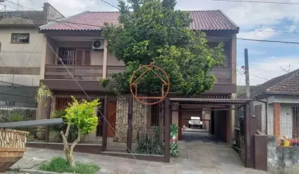 Casa com 3 quartos à venda na Travessa Lençóis, 58, Vila Ipiranga, Porto Alegre por R$ 1.500.000