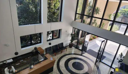 Sala comercial em prédio padrão Porte Construtora