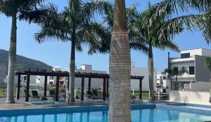 Terreno financiável em condomínio Clube em Biguaçu
