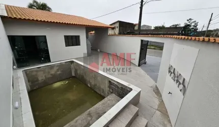 Casa com Piscina e ótima localização