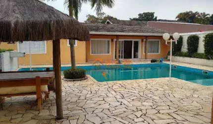 Sobrado com 4 dormitórios à venda, 650 m² por R$ 3.000.000,00 - Condomínio Shambala I - Atibaia/SP