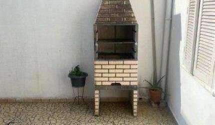 Sobrado com 3 dormitórios à venda, 154 m² por R$ 1.070.000,00 - Gonzaga - Santos/SP