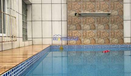 Casa 3 dormitórios , móveis planejados, área gourmet, piscina , cozinha planejada, área de serviço,3 banheiros, 6 vagas de garagem
