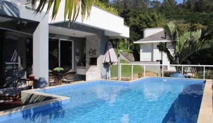 Casa com 3 dormitórios à venda, 350 m² por R$3.130.000 - Cacupé - Florianópolis/SC