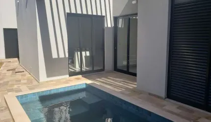 Casa em condomínio fechado com 3 quartos à venda no Grand Ville, Uberlândia  por R$ 1.250.000