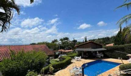 Casa com 3 dormitórios à venda, 620 m² por R$ 1.590.000,00 - Condomínio Hari Country Club - Santa Isabel/SP