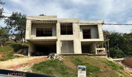 Casa com 4 dormitórios à venda, 415 m² por R$ 1.280.000,00 - Condomínio Reserva Ibirapitanga - Santa Isabel/SP