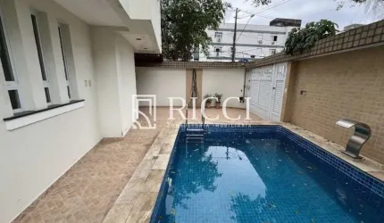 Se encante com esse sobrado isolado com piscina exclusiva na Aparecida!