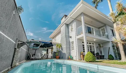 Casa com 4 dormitórios à venda, 344 m² por R$ 1.700.000 - Centro - Pinhais/PR