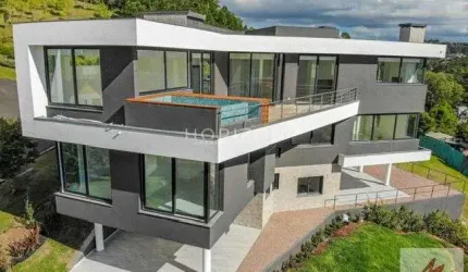 CASA DE LUXO NO CONDOMINIO ALPHA VILLE EM GRAMADO-RS.