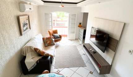 Apartamento pé na areia 4 dormitórios na Praia das Toninhas