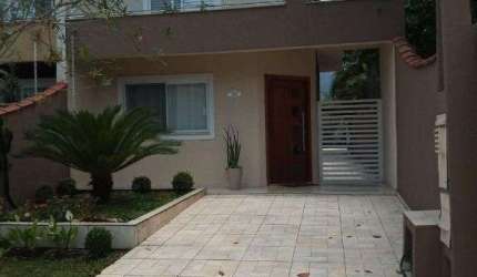 Casa com 3 dormitórios à venda, 169 m² por R$ 1.250.000 - Boracéia - Bertioga/SP