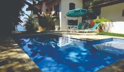 Sobrado Paradisíaco no Verde Mar: Conforto e Luxo à Beira-Mar