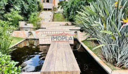 Casa à venda com 4 suítes em condomínio
