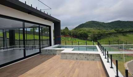 CASA EM CONDOMINIO 3 SUITES E VISTA PANORÂMICA