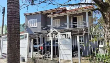 Sobrado Residencial à venda, Centro, Esteio - SO0113.