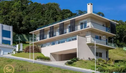 Casa com 5 dormitórios à venda por R$ 7.000.000,00 - Praia do Estaleiro - Balneário Camboriú/SC