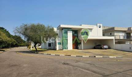 Imponente casa de alto padrão à venda em Jacareí-SP no Condomínio Sunset Garden: 4 quartos, 4 suítes, 3 salas, 6 banheiros, 6 vagas de garagem e 590m² de área