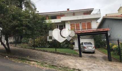 Casa com 6 quartos à venda em Menino Deus - RS