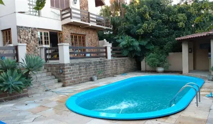 Condomínio com 4 quartos à venda ou para locação em Cavalhada - RS