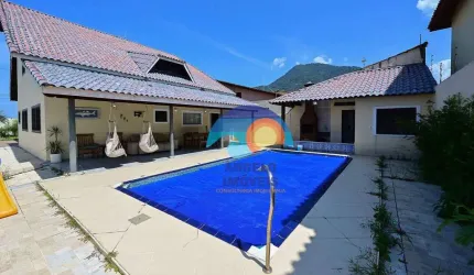 Sobrado com 4 dormitórios à venda, 310 m² por R$ 820.000,00 - Centro - Peruíbe/SP
