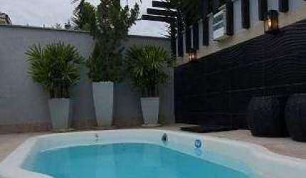 CASA EM CONDOMÍNIO à venda, 3 quartos, 3 suítes, 1 vaga, Jardim Karaíba - Uberlândia/MG