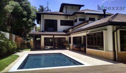 Casa com 4 dormitórios à venda, 447 m² por R$ 2.660.000,00 - Condomínio Chácara Flora - Valinhos/SP