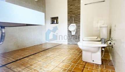 Casa com 3 quartos à venda no Jardim Anhangüera, Ribeirão Preto  por R$ 1.064.000