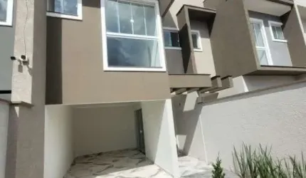 Sobrado novo pronto para morar, 450 metros da praia,  3 dormitórios, sendo 1 suí