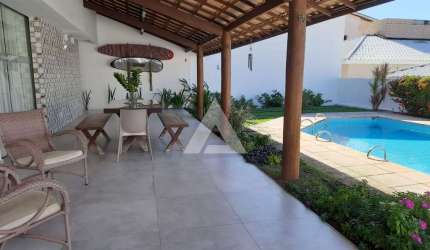Casa em Vilas do Atlântico com 4 suítes, 317m² à venda por R$ 1.750.000,00