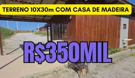 [470 ] TERRENO EM GOVERNADOR CELSO RAMOS SC 10X30M COM CASA DE MADEIRA. PODE FAZER 2 CASAS