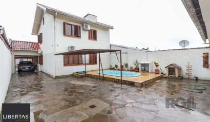 Casa 4 dormitórios no bairro  Aberta dos Morros