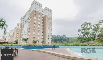 Apartamento de três dormitórios, suíte e uma vaga de garagem no bairro Jardim Carvalho em Porto Alegre.