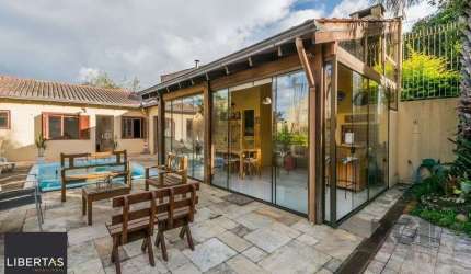 Casa 279m² - 4 dormitórios, 3 vagas no bairro Santa Tereza