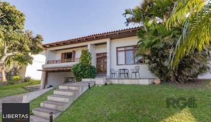 Casa de Condomínio em Cavalhada