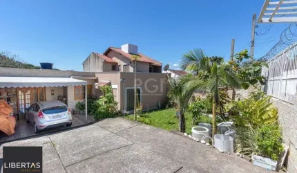 Casa para Venda - 370m², 4 dormitórios, sendo 1 suites, 6 vagas - Lomba do Pinheiro