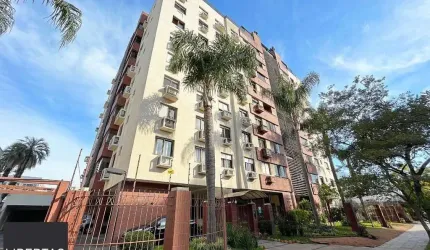 Apartamento de três dormitórios, suíte e uma vaga de garagem no bairro Menino Deus em Porto Alegre.