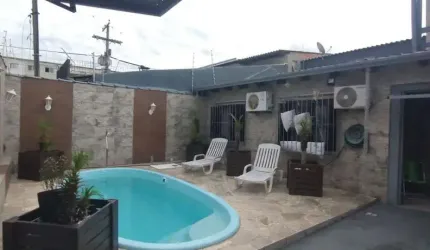 Casa no bairro Restinga com piscina com 4 dormitórios