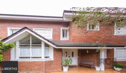 Casa à venda com 4 dormitórios, 372m² e 4 vagas