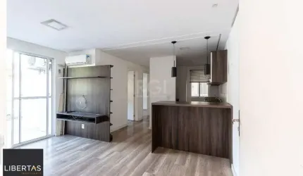 Apartamento 2 dormitórios , sala com dois ambientes , cozinha americana sacada com churrasqueira 1 vaga