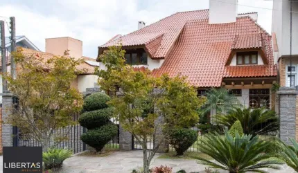 Casa para Venda com 4 dormitórios, sendo 2 suites e 4 vagas no bairro Jardim Isabel
