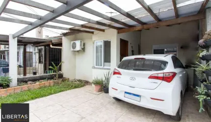 Casa terrea de 2 dormitórios, em excelente localização, amplo pátio e local tranquilo.
