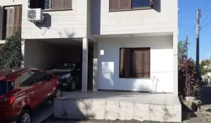 Casa quatro dormitórios ( 1 suíte) garagem ( 2 carros)
